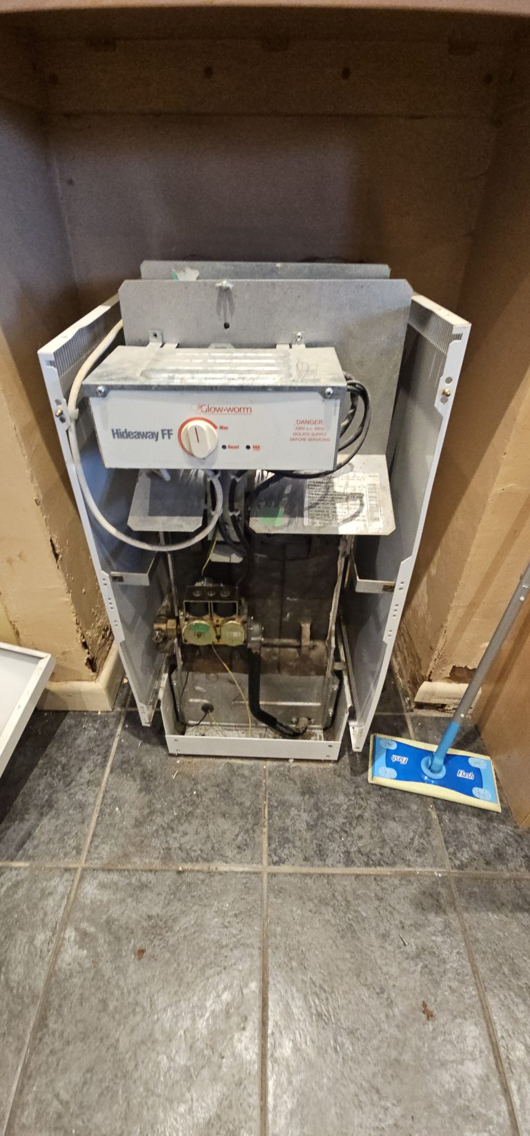 Glow-worm Hideaway FF floor-standing boiler in need of servicing or replacement in Wigan property